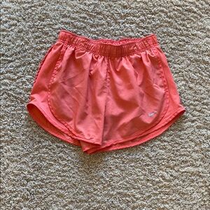 Nike Women's Bright Coral Athletic Shorts. Size small